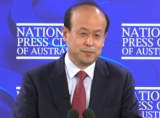 Xiao Qian addressing the National Press Club in Canberra on Wednesday.